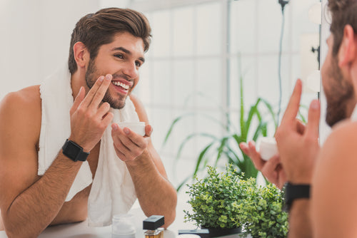 guy using electric razor