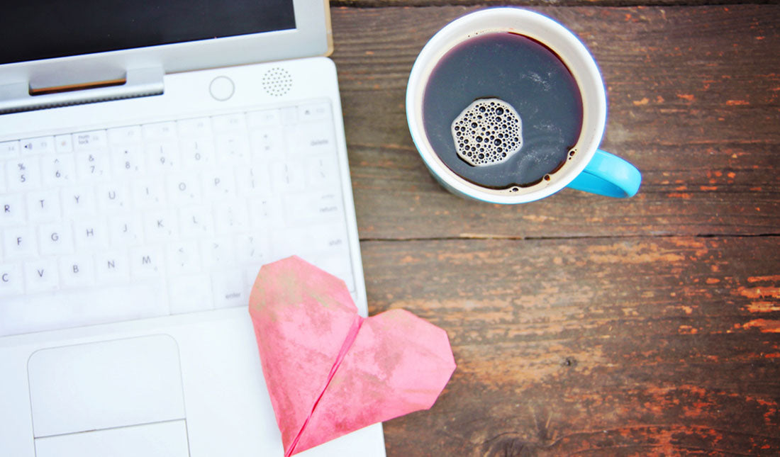 laptop with heart origami