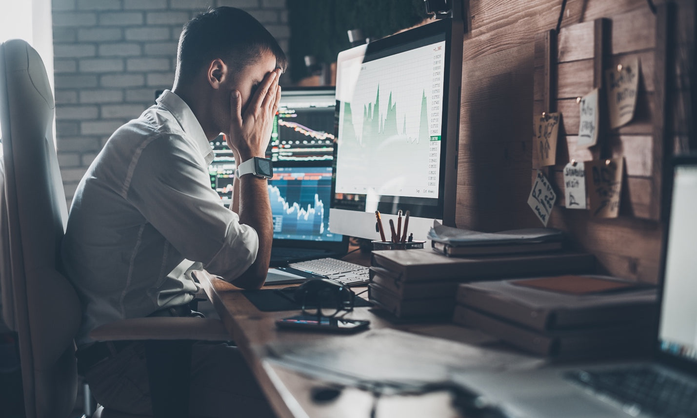 Man in his office feeling stressed