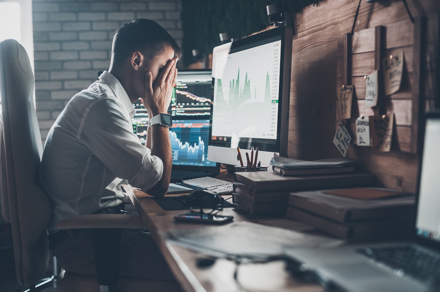 Man in his office feeling stressed